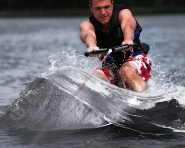 This photo of a wakeboarder riding a "wakeboarding" wave is used courtesy of Chris Coudron of Ames, Iowa. (subject).
